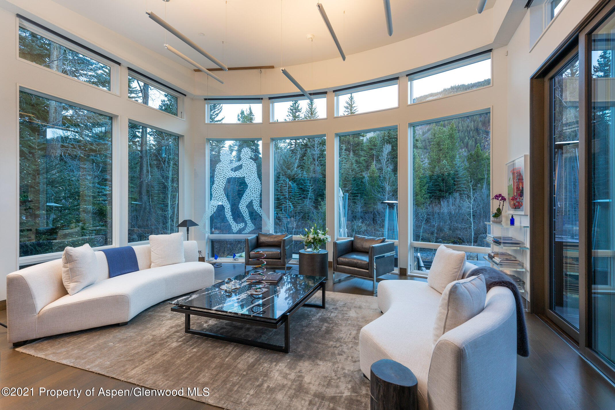 79 Winter Way Aspen, CO 81611 - Photo 2 of 40 a living room with furniture and a large window