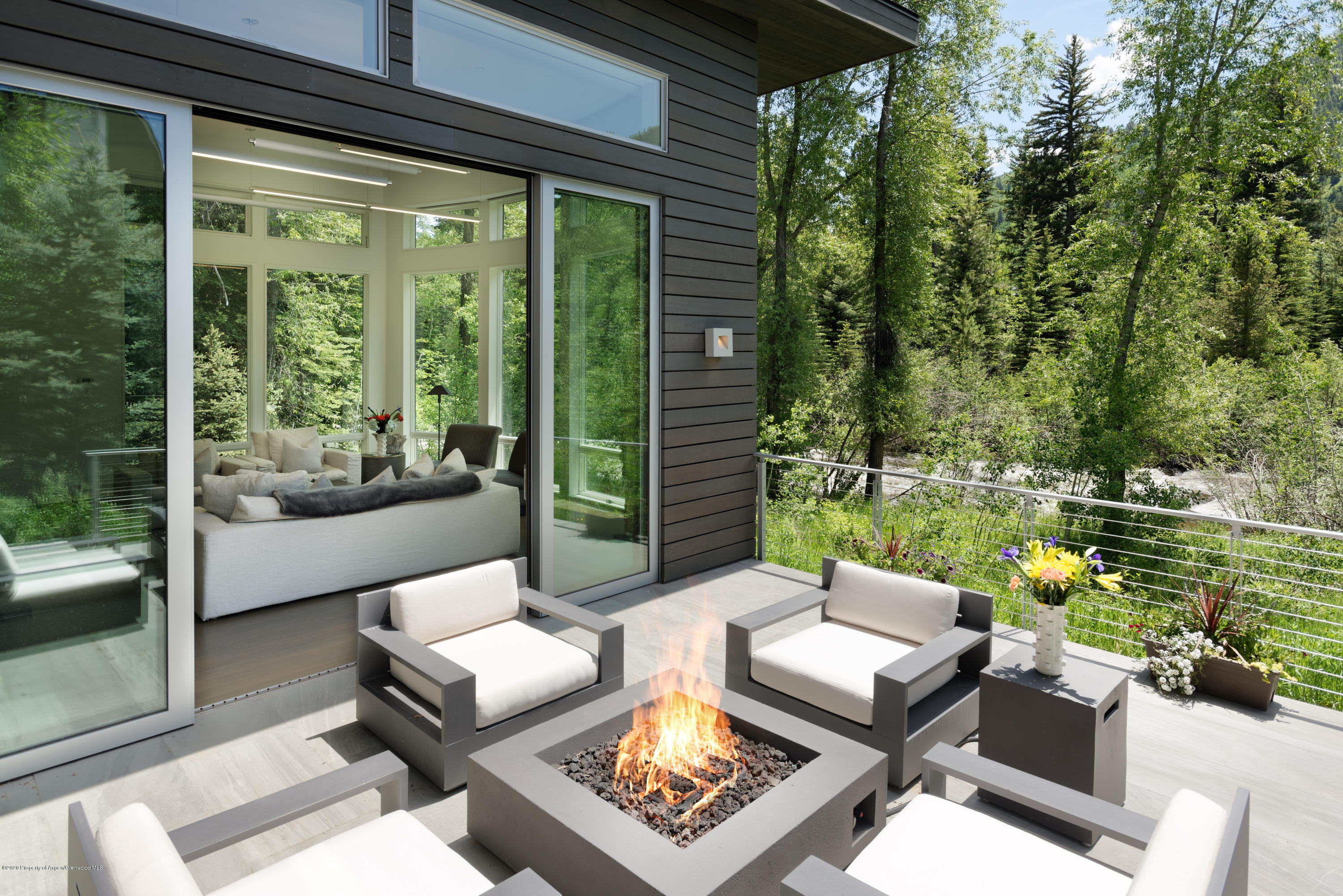 79 Winter Way Aspen, CO 81611 - Photo 34 of 40 a outdoor living space with furniture and garden view