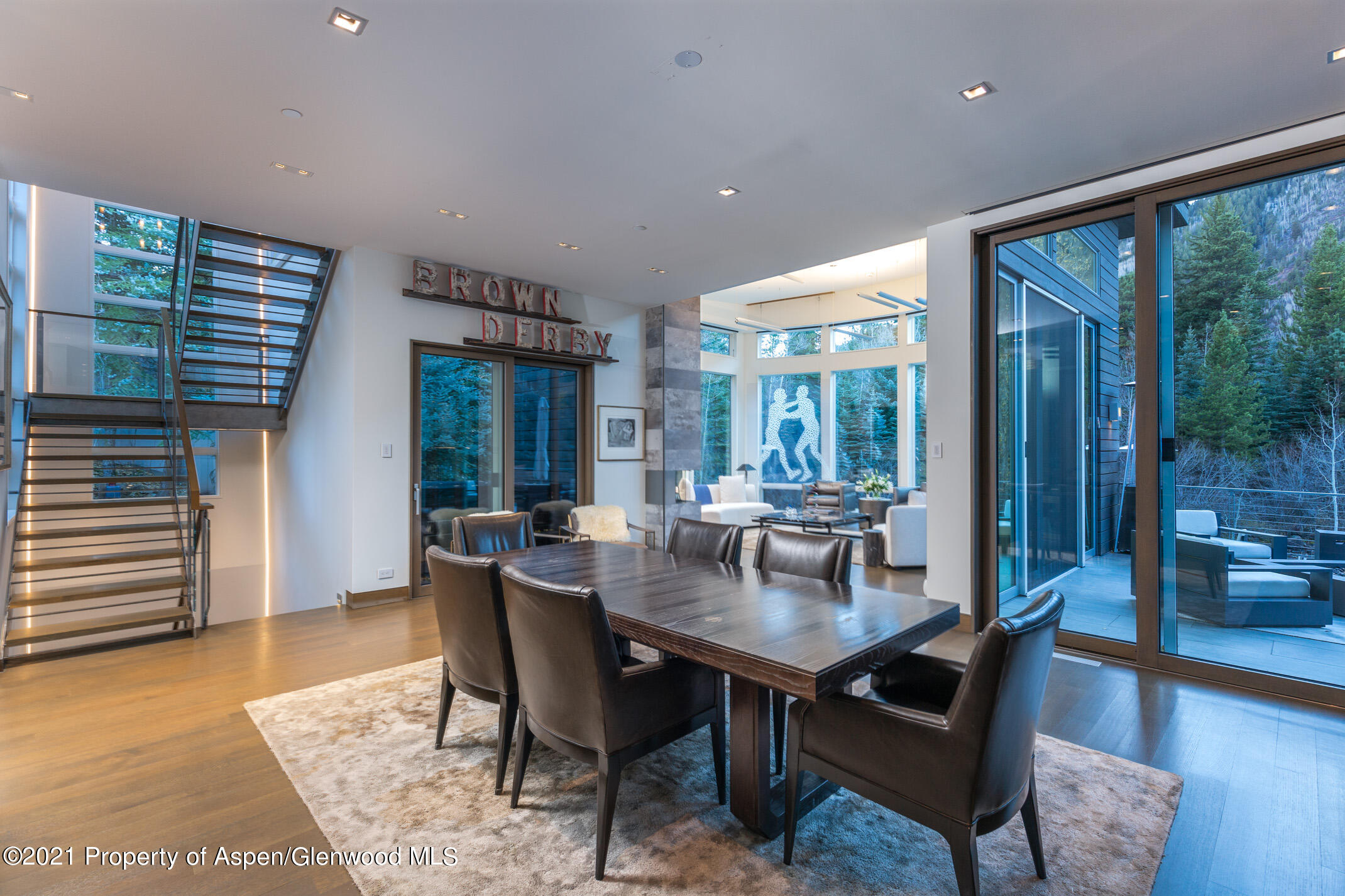 79 Winter Way Aspen, CO 81611 - Photo 4 of 40 a dining room with furniture and wooden floor