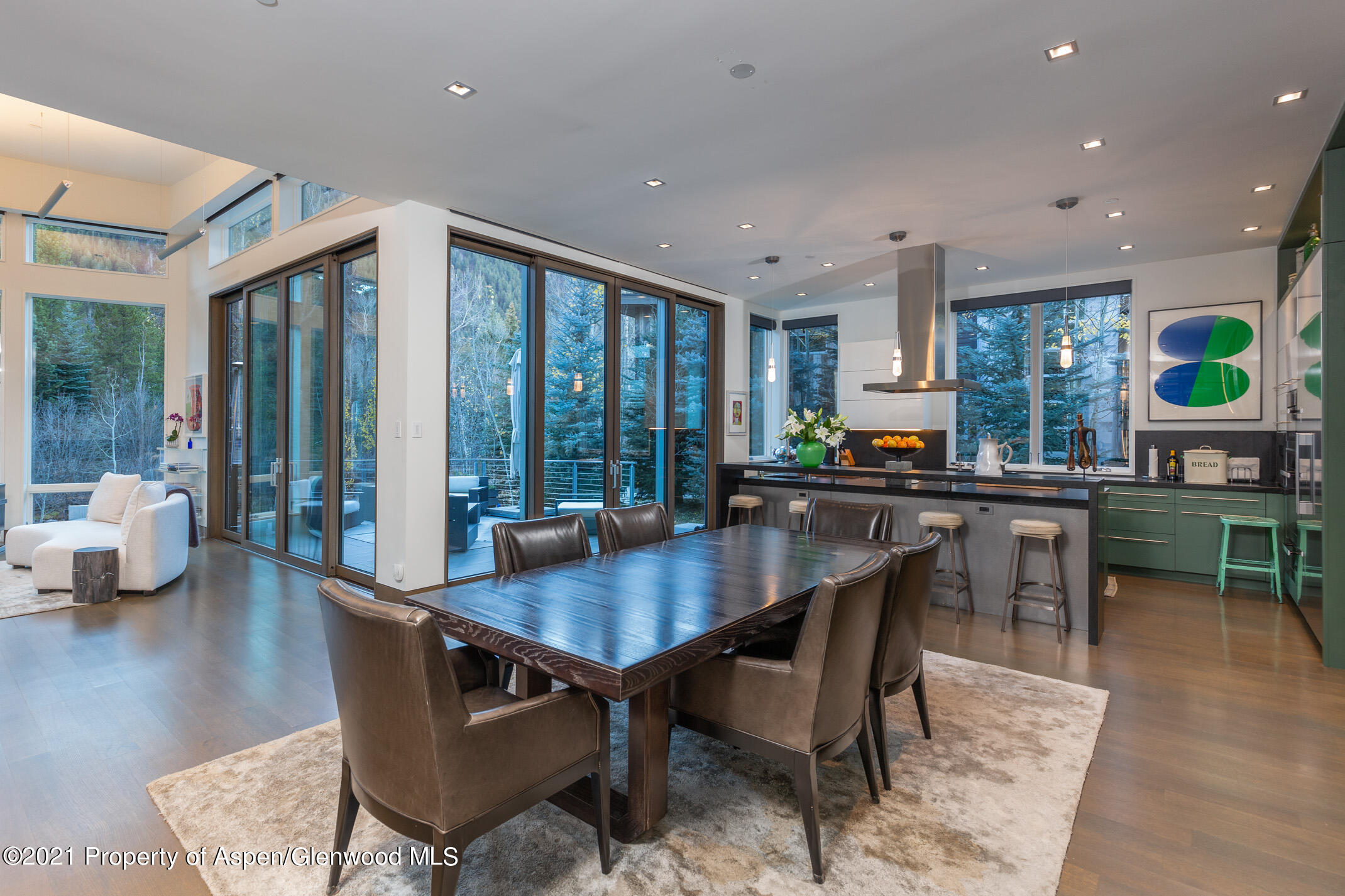 79 Winter Way Aspen, CO 81611 - Photo 5 of 40 a view of a dining room with furniture window and wooden floor
