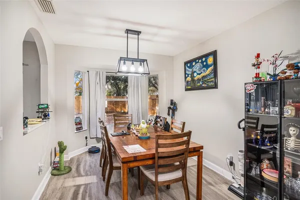 a view of a dining room with furniture