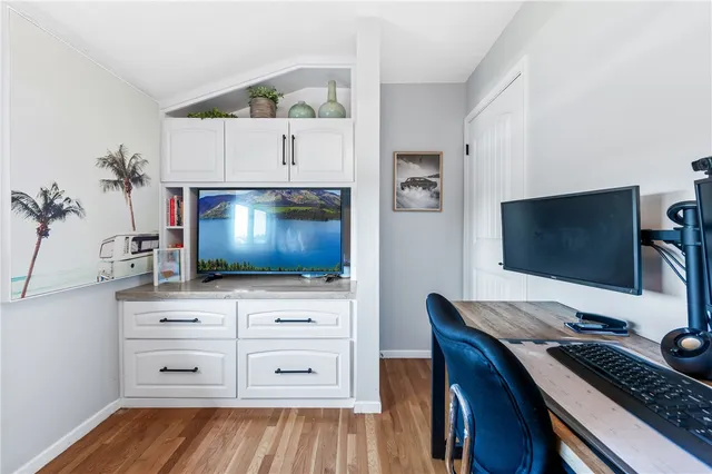 a view of a patio with a table and chairs
