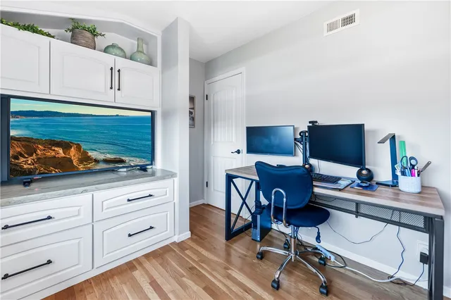 a view of a back yard from a balcony