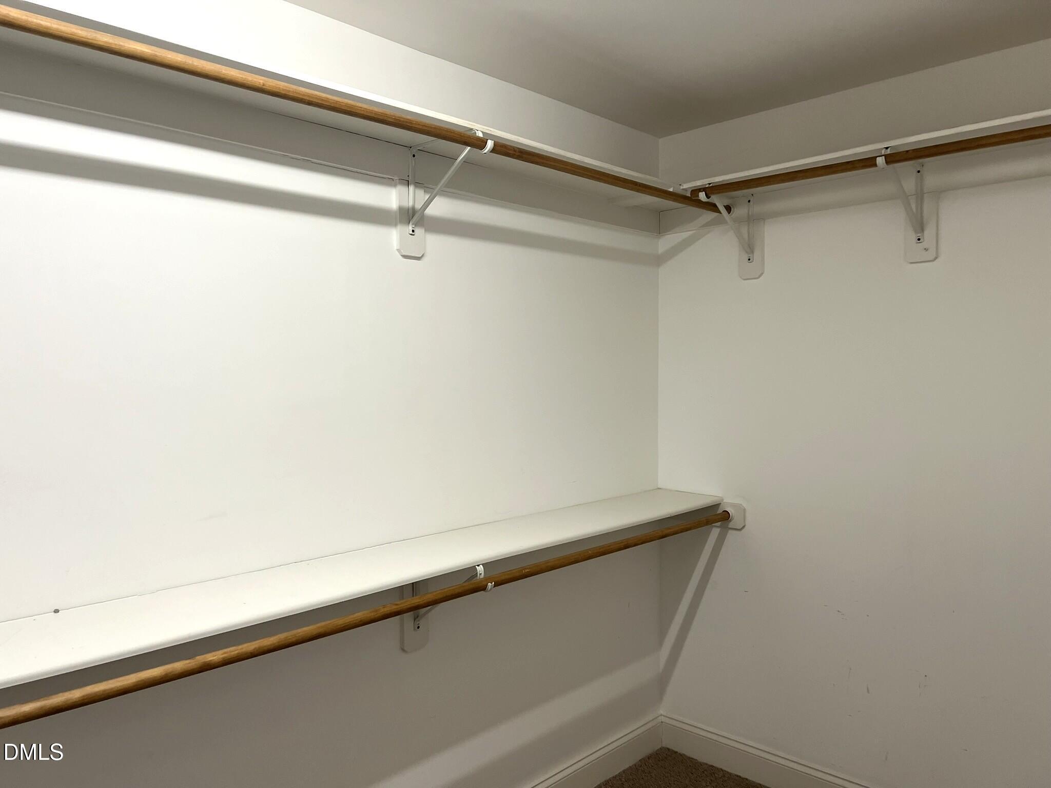 236 Fieldtrial Circle Garner, NC 27529 - Photo 11 of 31 Walk in Closet - Primary Bedroom