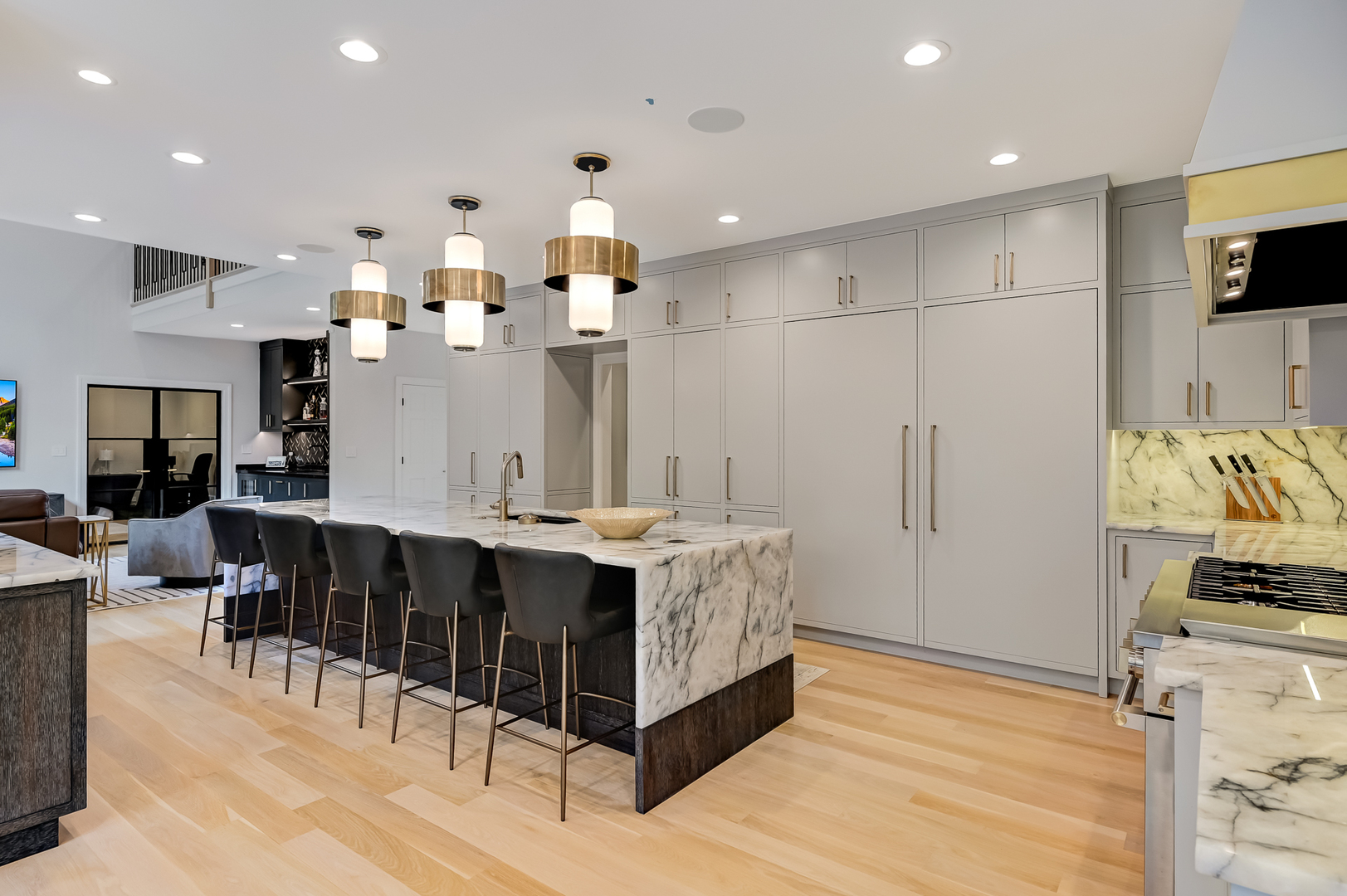 1813 Kelly Court Darien, IL 60561 - Photo 19 of 56 a large kitchen with stainless steel appliances a large counter top a stove and a refrigerator