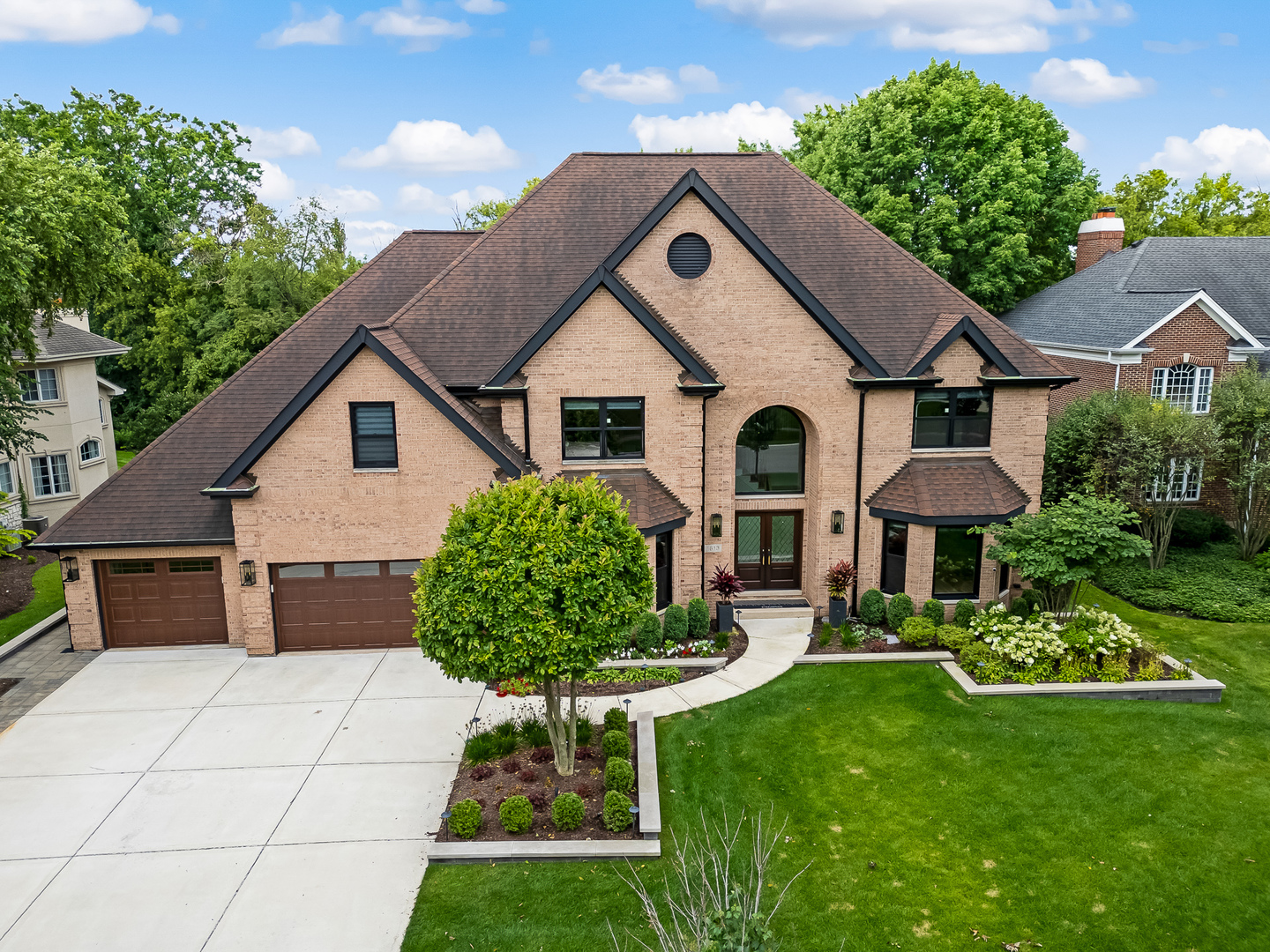 1813 Kelly Court Darien, IL 60561 - Photo 2 of 56 a house view with a garden space