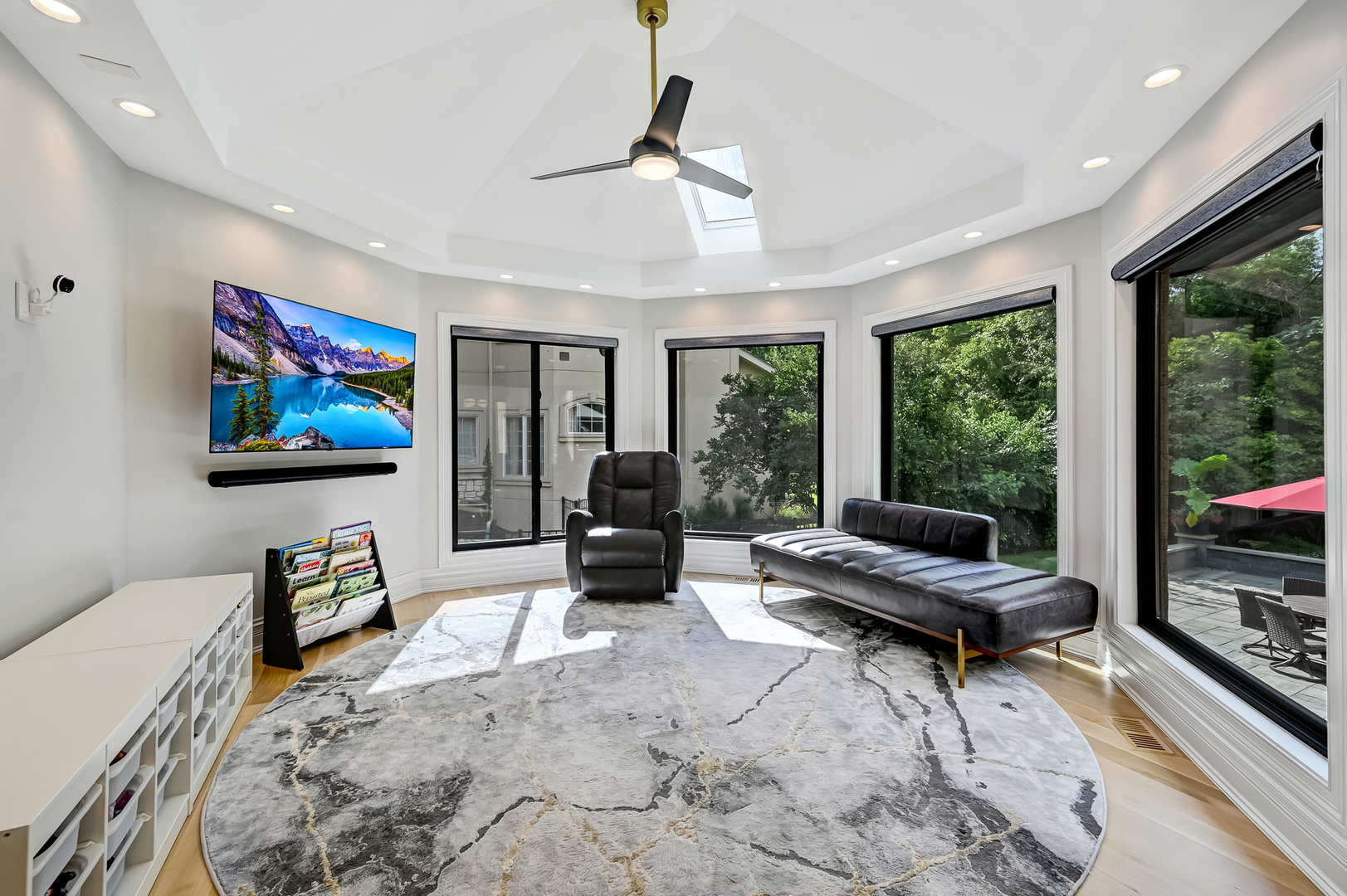 1813 Kelly Court Darien, IL 60561 - Photo 24 of 56 a living room with furniture and a flat screen tv