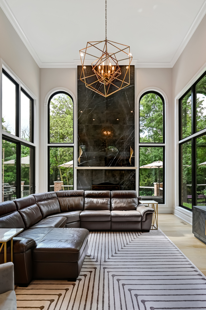 1813 Kelly Court Darien, IL 60561 - Photo 28 of 56 a living room with furniture and a large window