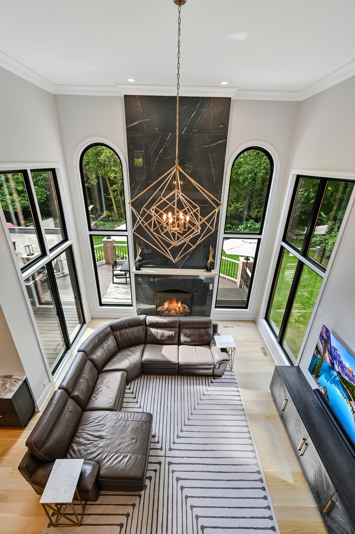 1813 Kelly Court Darien, IL 60561 - Photo 31 of 56 a living room with furniture and a floor to ceiling window