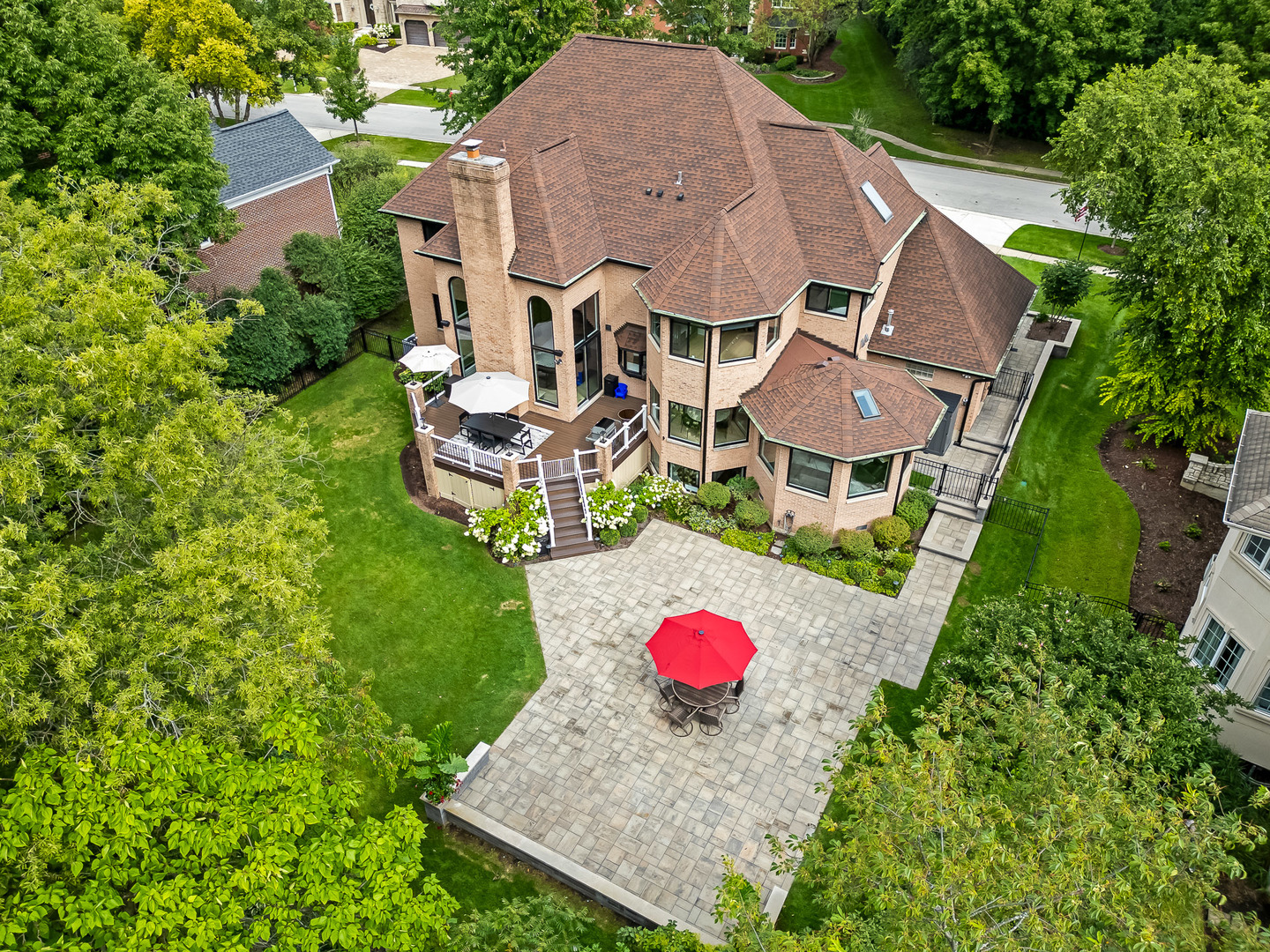 1813 Kelly Court Darien, IL 60561 - Photo 4 of 56 an aerial view of a house with table and chairs