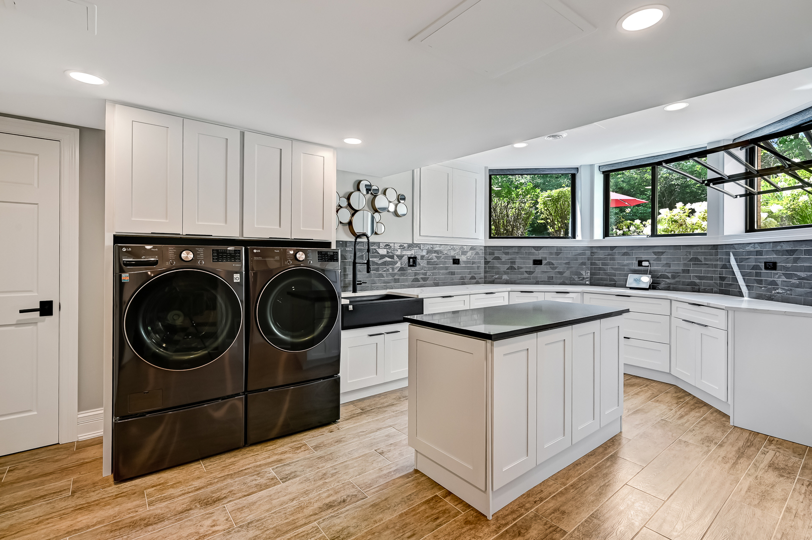 1813 Kelly Court Darien, IL 60561 - Photo 50 of 56 a kitchen with stainless steel appliances granite countertop a sink and a wooden floors