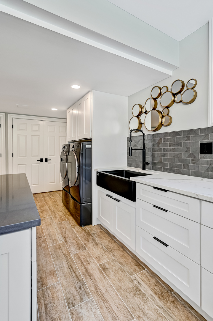 1813 Kelly Court Darien, IL 60561 - Photo 51 of 56 a kitchen with granite countertop white cabinets and stainless steel appliances