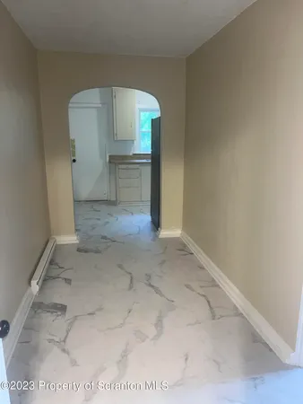 a kitchen with sink cabinets and window