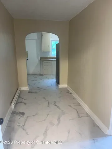 a kitchen with sink cabinets and window