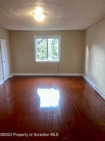 a bathroom with a bathtub a toilet and a sink