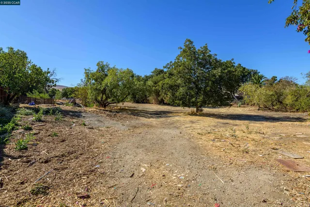 a view of road with houses