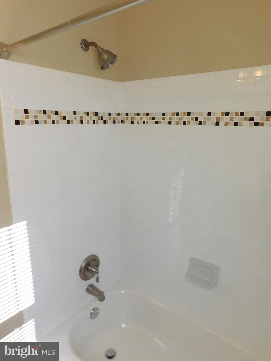 6138 Edlynne Road Baltimore, MD 21239 - Photo 22 of 30 Ceramic Tiles & Modern Upgrades