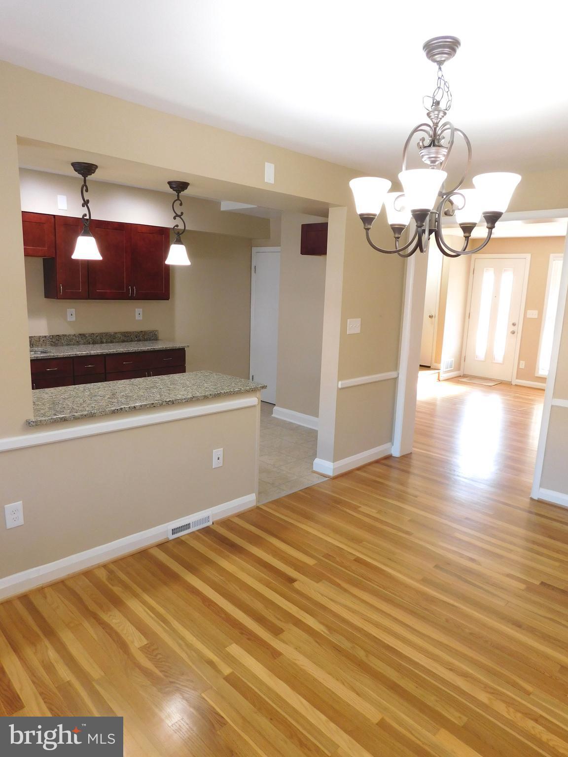 6138 Edlynne Road Baltimore, MD 21239 - Photo 7 of 30 Dining Room/Kitchen