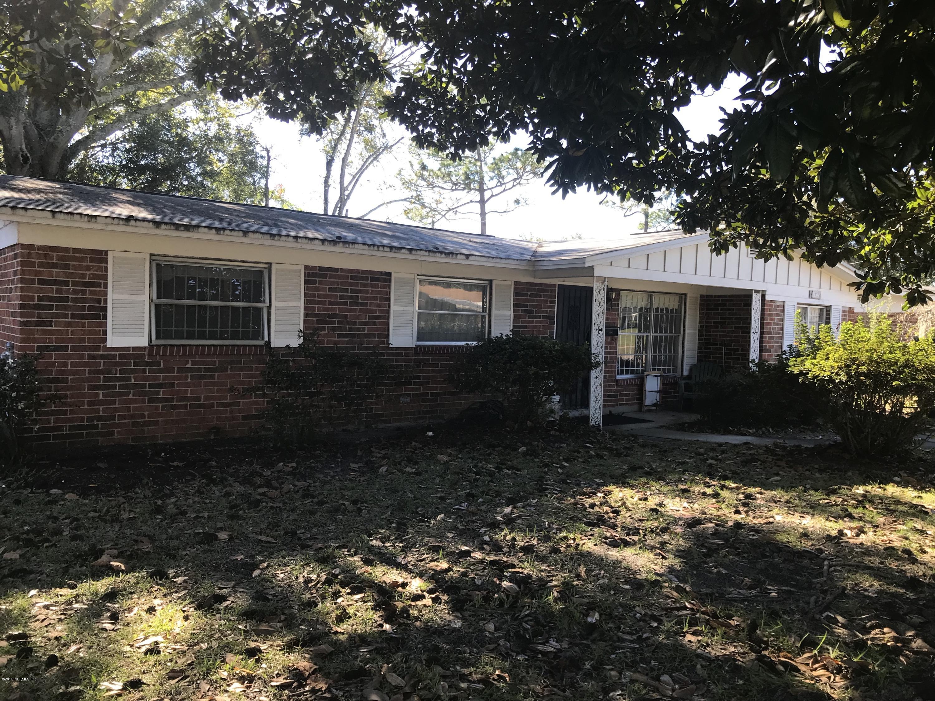 1032 Player Road Jacksonville, FL 32218 - Photo 1 of 12 a view of a house with yard and a tree