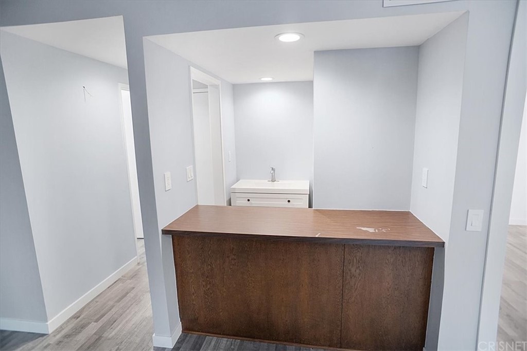 12230 Stewarton Drive Porter Ranch, CA 91326 - Photo 10 of 25 a room with a sink