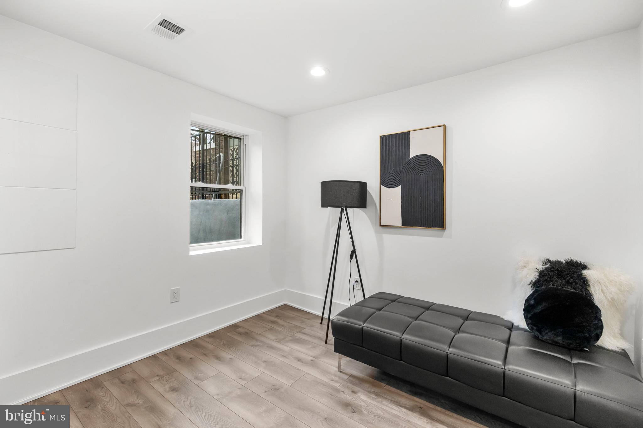 113 18th Street Southeast, Unit 1 Washington, DC 20003 - Photo 12 of 37 a living room with furniture