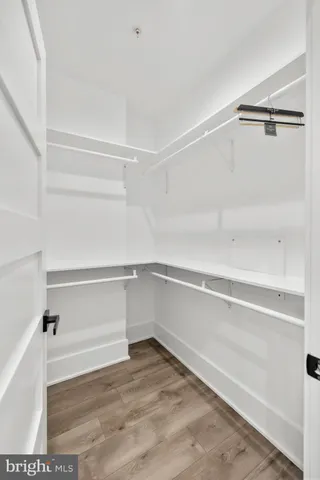 a view of an empty walk in closet