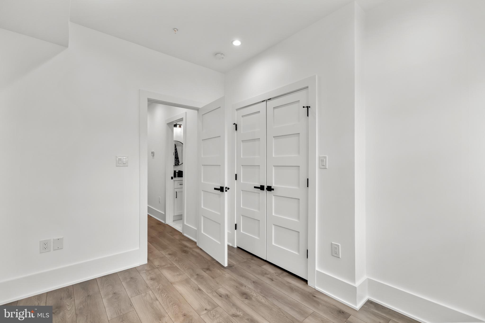 113 18th Street Southeast, Unit 1 Washington, DC 20003 - Photo 23 of 37 a view of a hallway with wooden floor