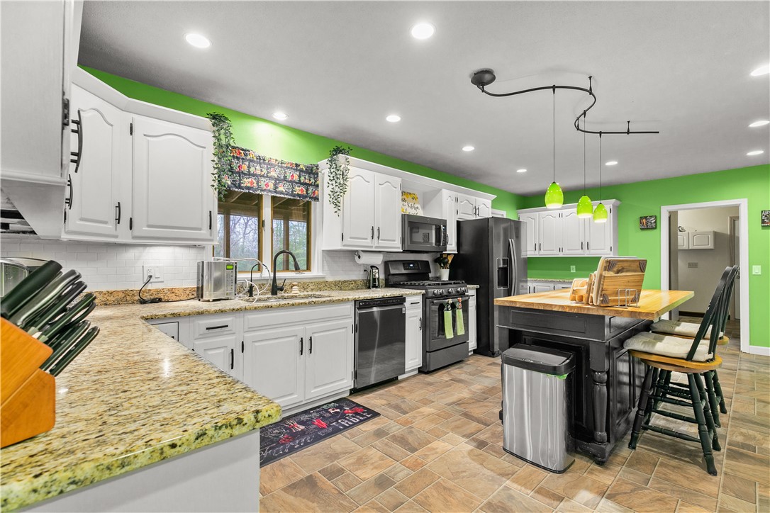 831 Crandall Road Tiverton, RI 02878 - Photo 11 of 50 Kitchen with view to backyard