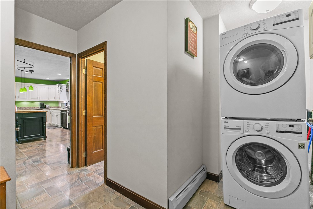 831 Crandall Road Tiverton, RI 02878 - Photo 16 of 50 Laundry Room with View to Kitchen