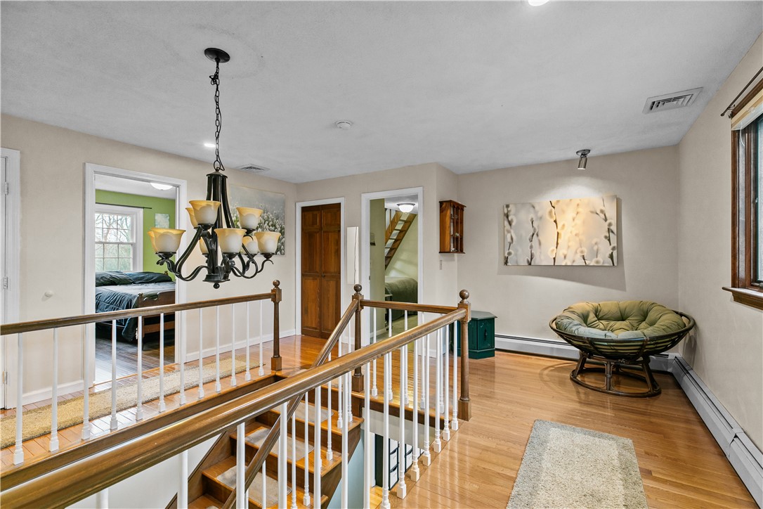 831 Crandall Road Tiverton, RI 02878 - Photo 23 of 50 Second Level Landing with view to bedrooms