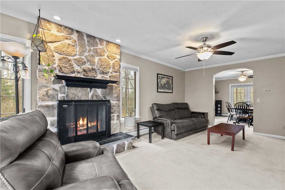 831 Crandall Road Tiverton, RI 02878 - Photo 4 of 50 Family Room with stonework and fireplace
