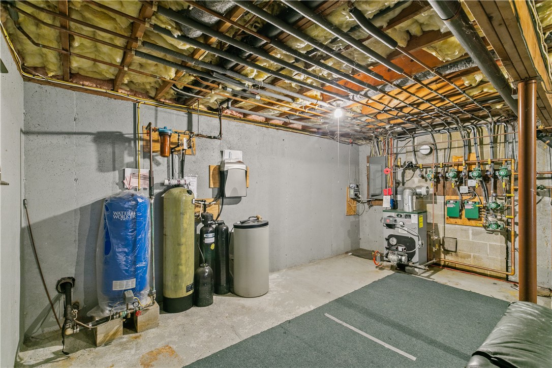 831 Crandall Road Tiverton, RI 02878 - Photo 41 of 50 Well system and view to mechanicals