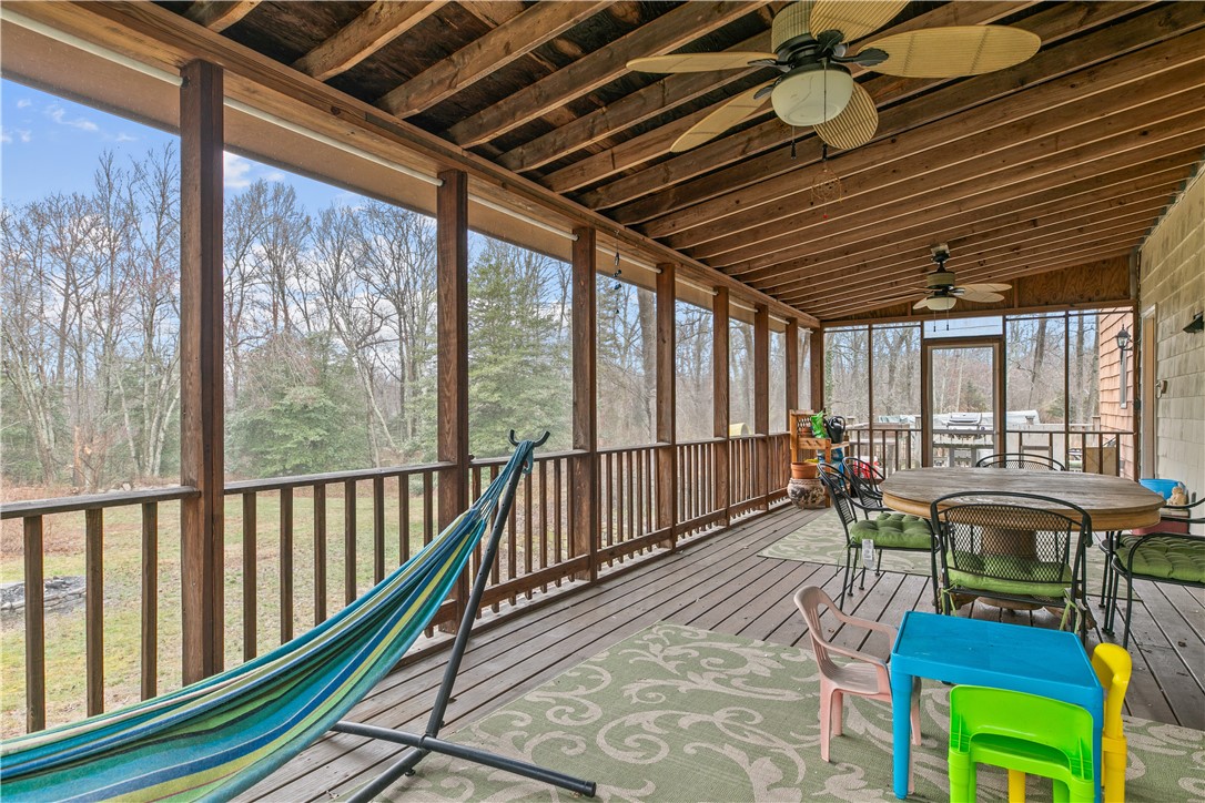 831 Crandall Road Tiverton, RI 02878 - Photo 43 of 50 Screened back porch
