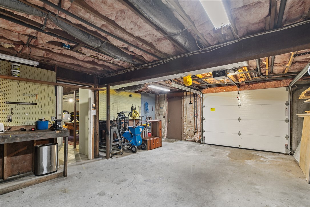 831 Crandall Road Tiverton, RI 02878 - Photo 47 of 50 Additional One-Car garage being used as a workshop