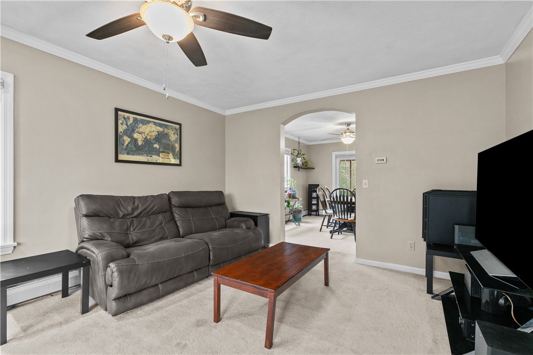 831 Crandall Road Tiverton, RI 02878 - Photo 6 of 50 Family Room with view to back of house & dining room