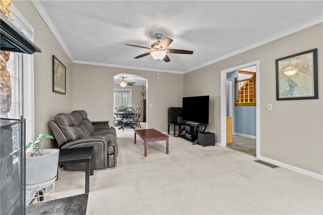 831 Crandall Road Tiverton, RI 02878 - Photo 7 of 50 Family Room with view to back of house & dining room