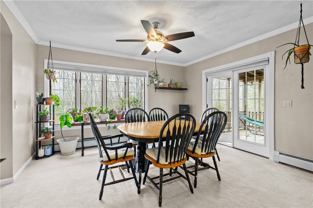 831 Crandall Road Tiverton, RI 02878 - Photo 8 of 50 Dining Room with French Doors to screened porch