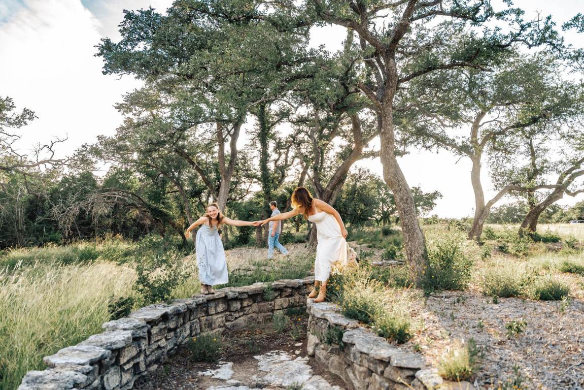 17650 A Hamilton Pool Road Austin, TX 78738 - Photo 2 of 12 a backyard of a house with lots of green space and lake view