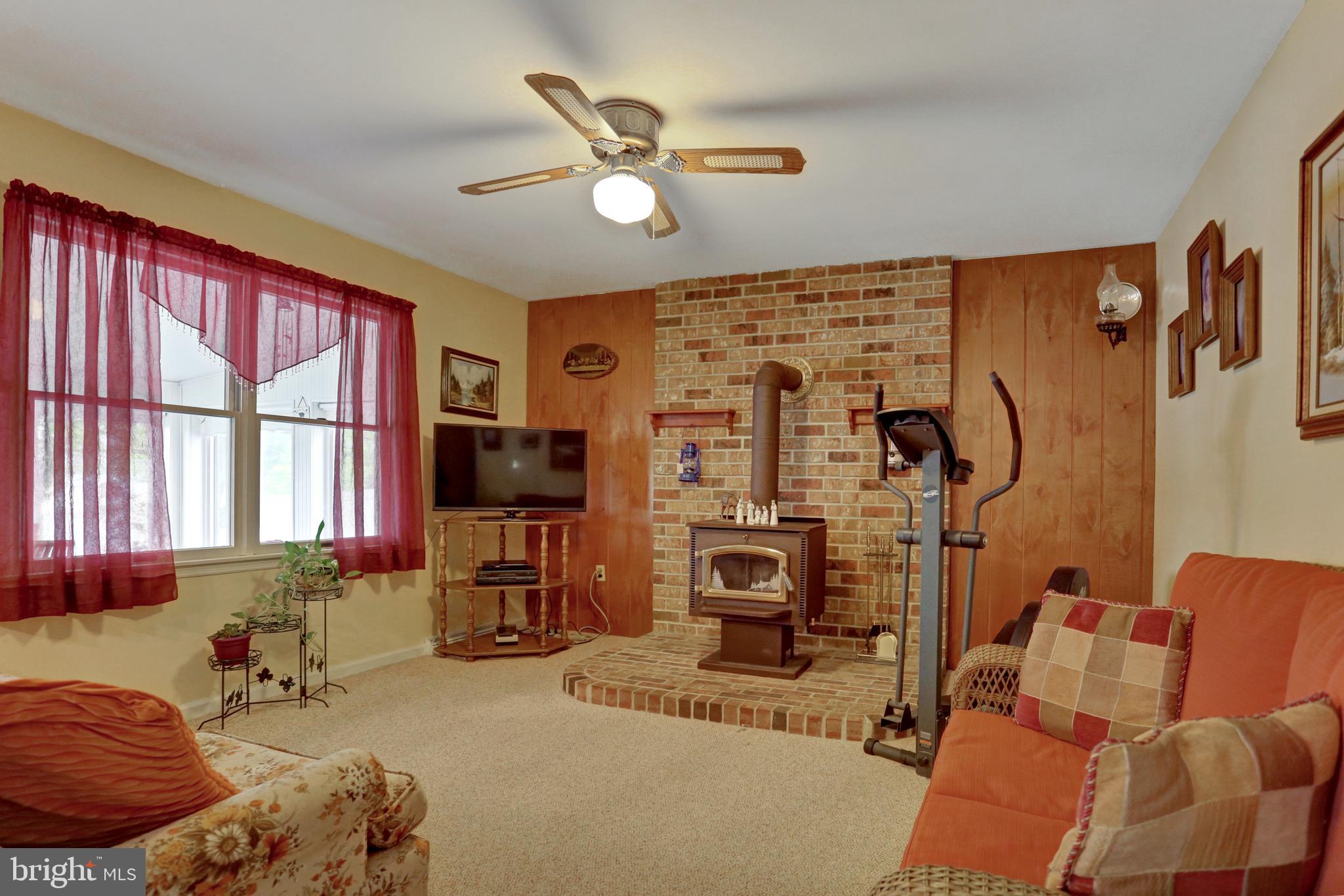 806 Blue Gate Lane Sinking Spring, PA 19608 - Photo 11 of 26 FAmily Room with wood burning stove