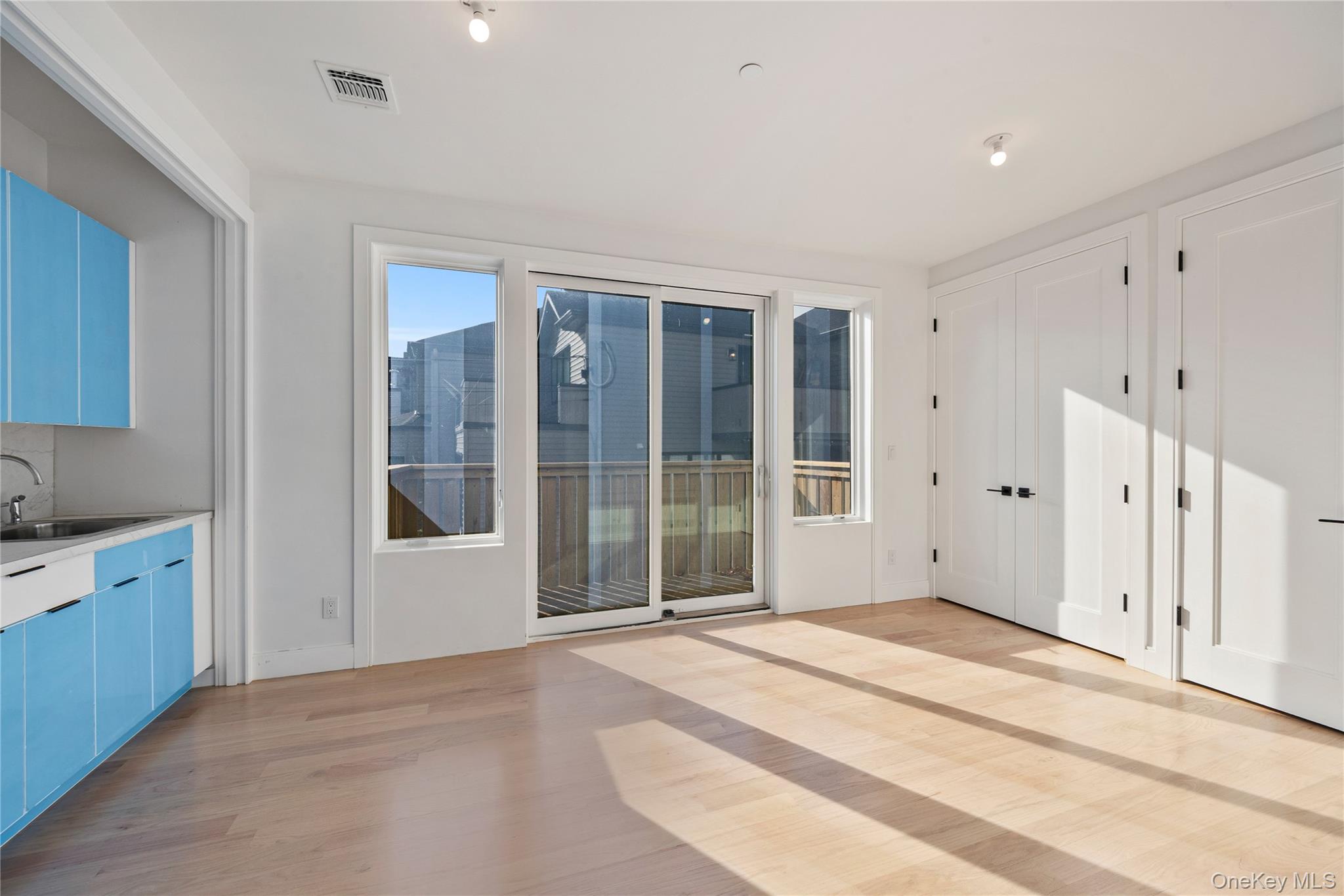 20 West Funston Avenue, Unit 212 Spring Valley, NY 10977 - Photo 15 of 34 a view of an empty room with window and chandelier
