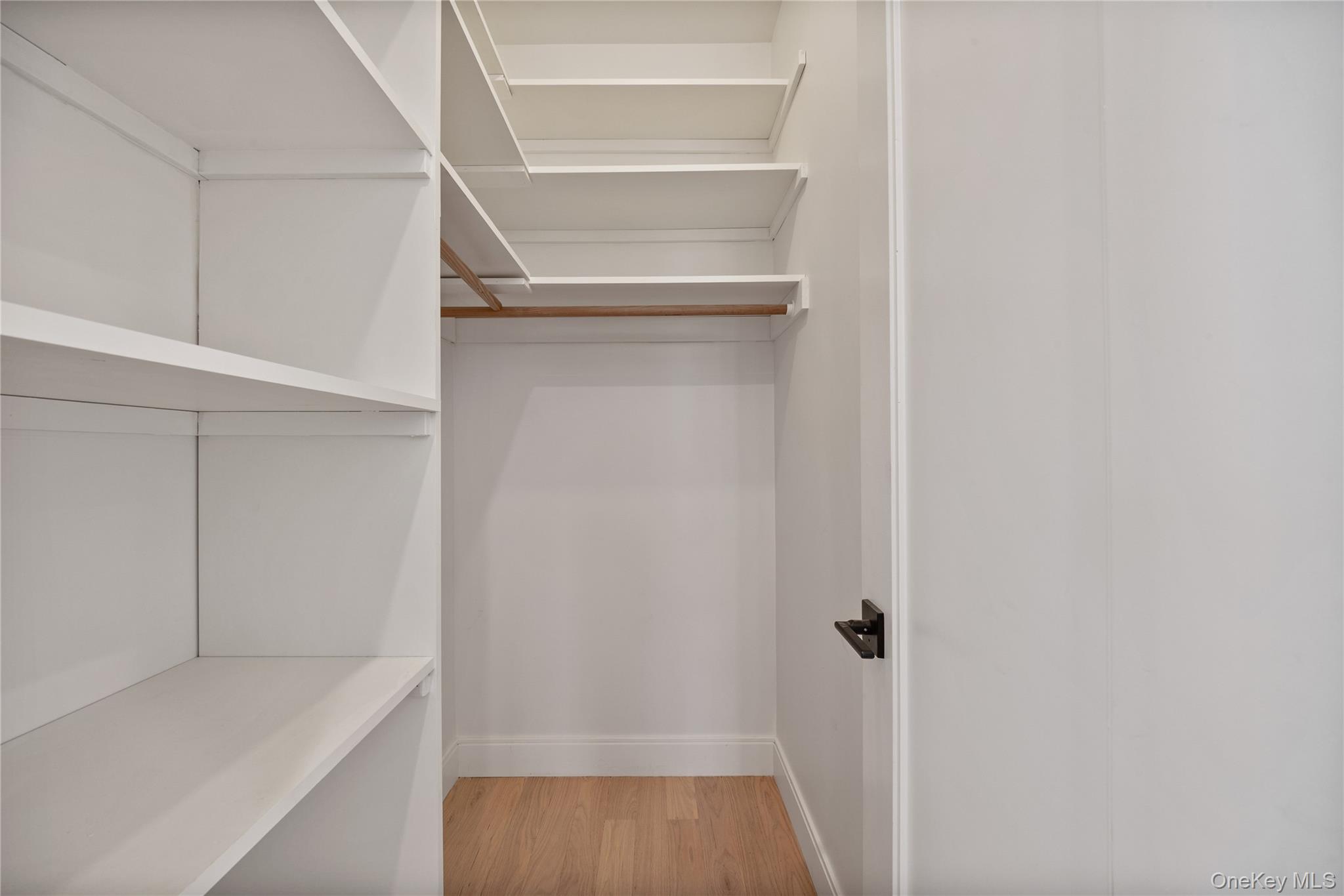 20 West Funston Avenue, Unit 212 Spring Valley, NY 10977 - Photo 10 of 34 a view of walk in closet with empty racks