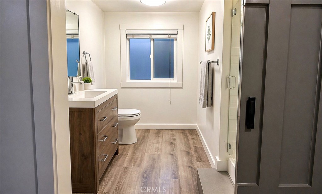 17490 Poplar Atascadero, CA 93422 - Photo 16 of 24 a bathroom with a sink and mirror