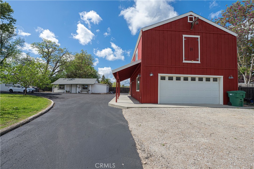 17490 Poplar Atascadero, CA 93422 - Photo 6 of 24 a front view of a house with a yard and garage