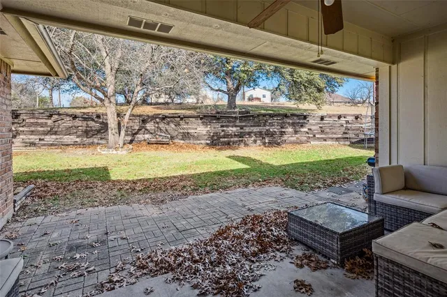 a view of a porch with a yard