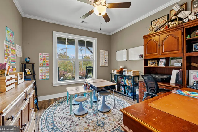 a view of a backyard with swimming pool