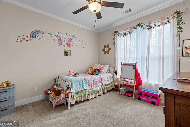 a view of a playground with basketball court