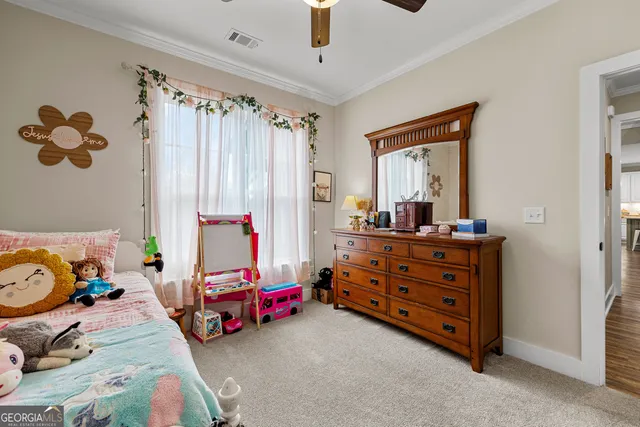 a view of a house with swimming pool and sitting area