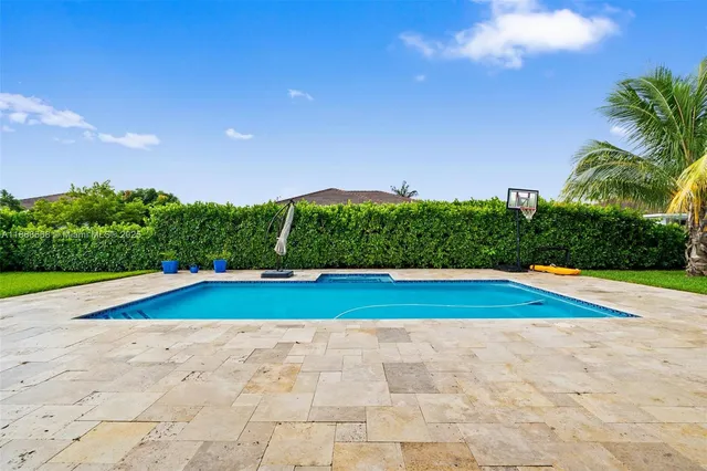 a view of outdoor space and pool