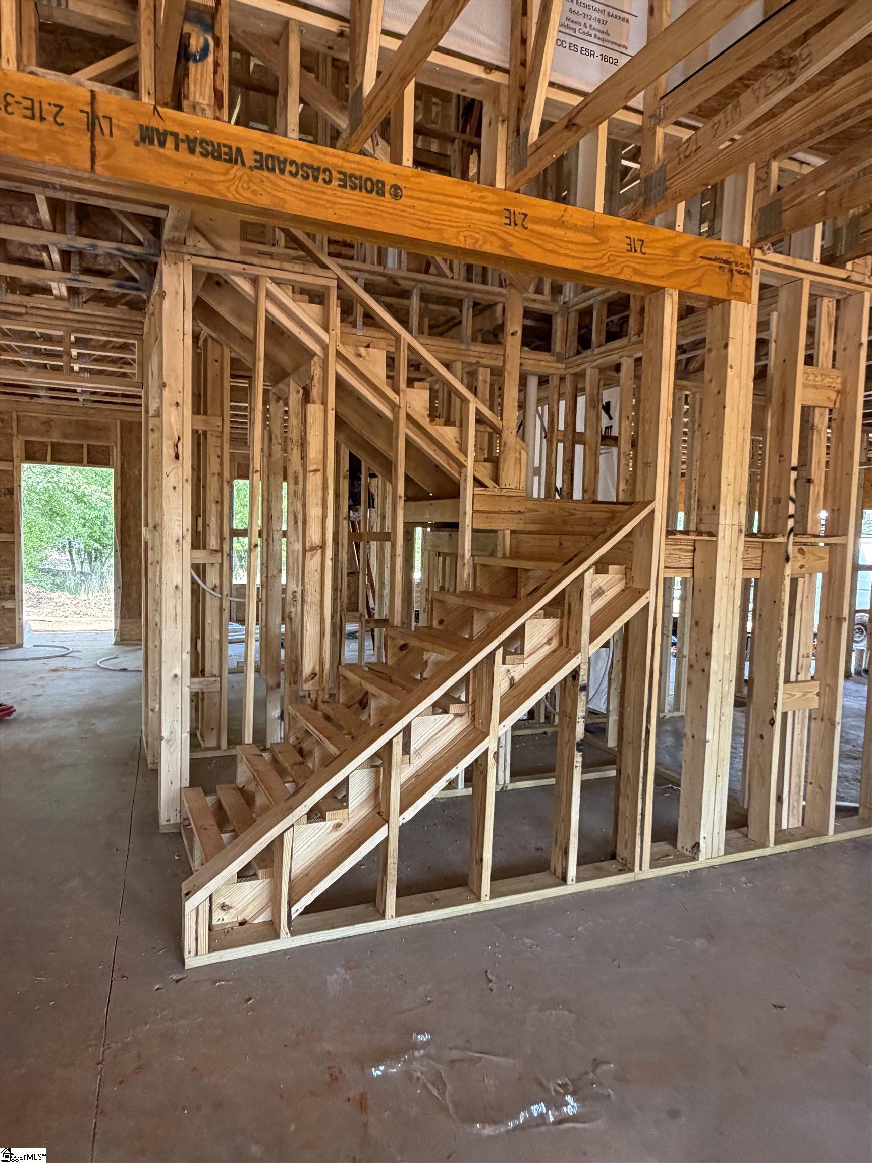 1820 Reidville Sharon Road, Unit SITE 1 Greer, SC 29651 - Photo 9 of 18 Hardwood turn back staircase