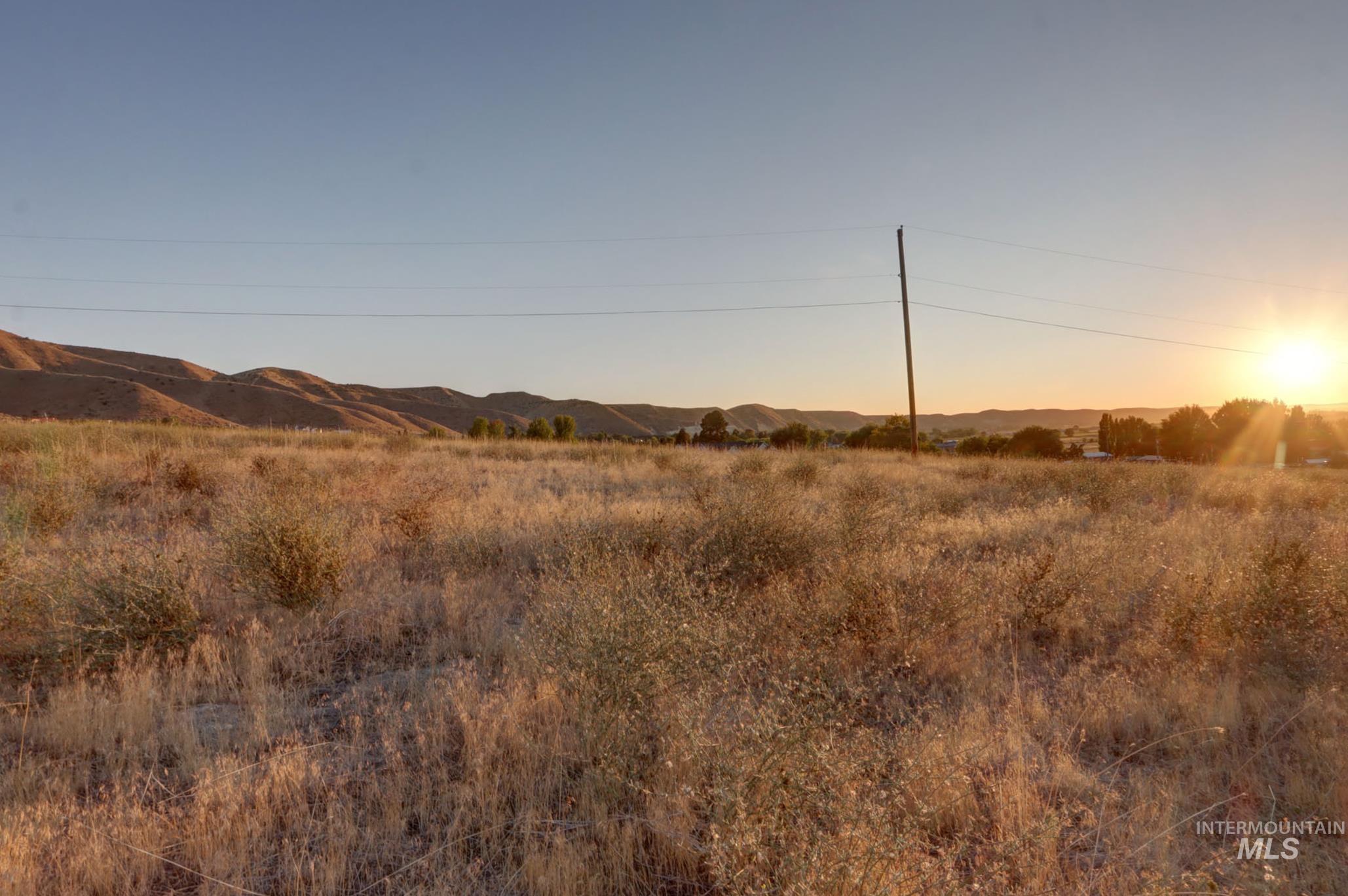779 West South Slope Road Emmett, ID 83617 - Photo 5 of 12 View of undeveloped land featuring mountains and rural landscape